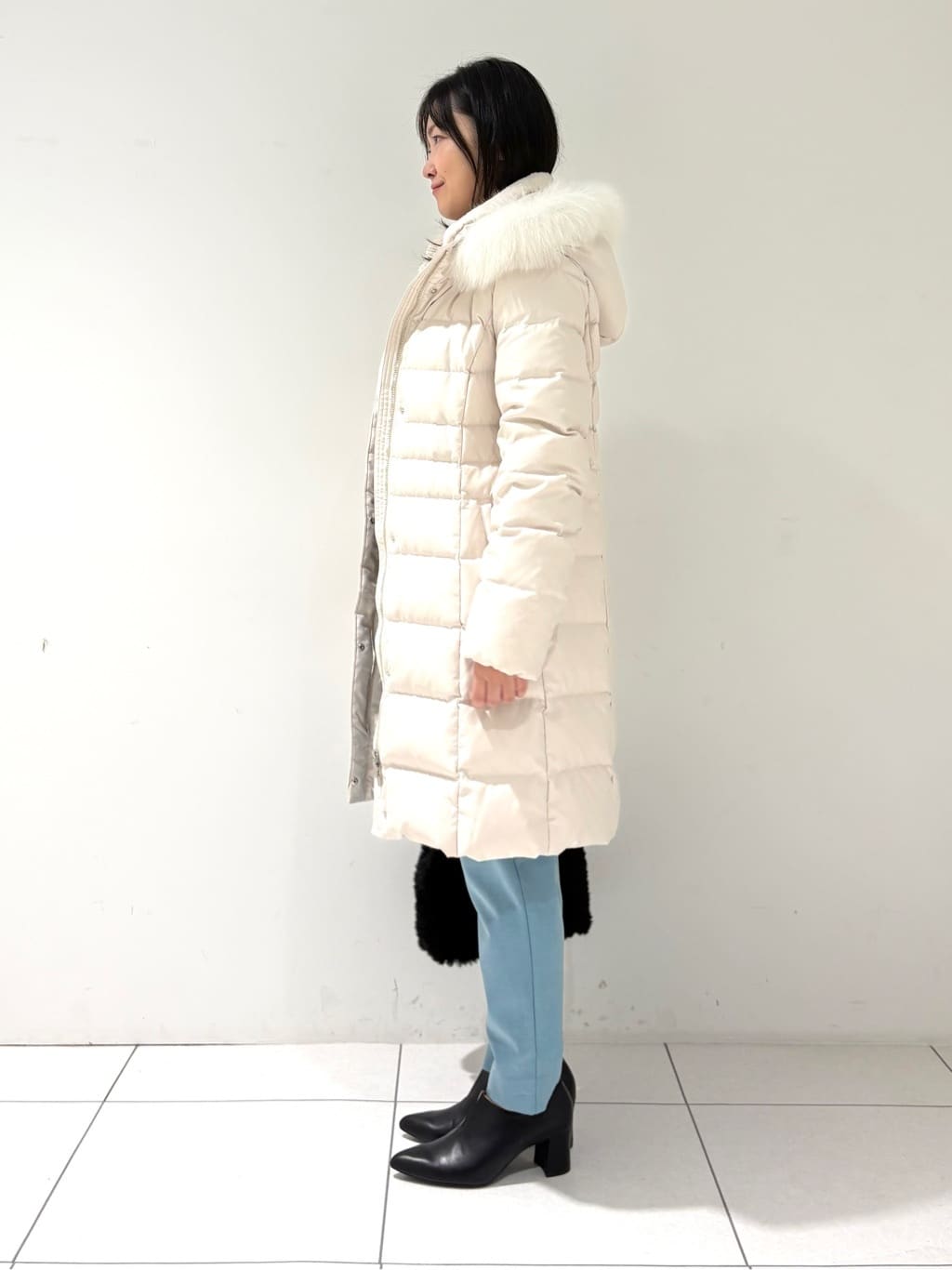 momokoさんの「INDIVI｜【洗える／毛玉になりにくい】エクストラファインウール ハイネックニット」を使ったコーディネート