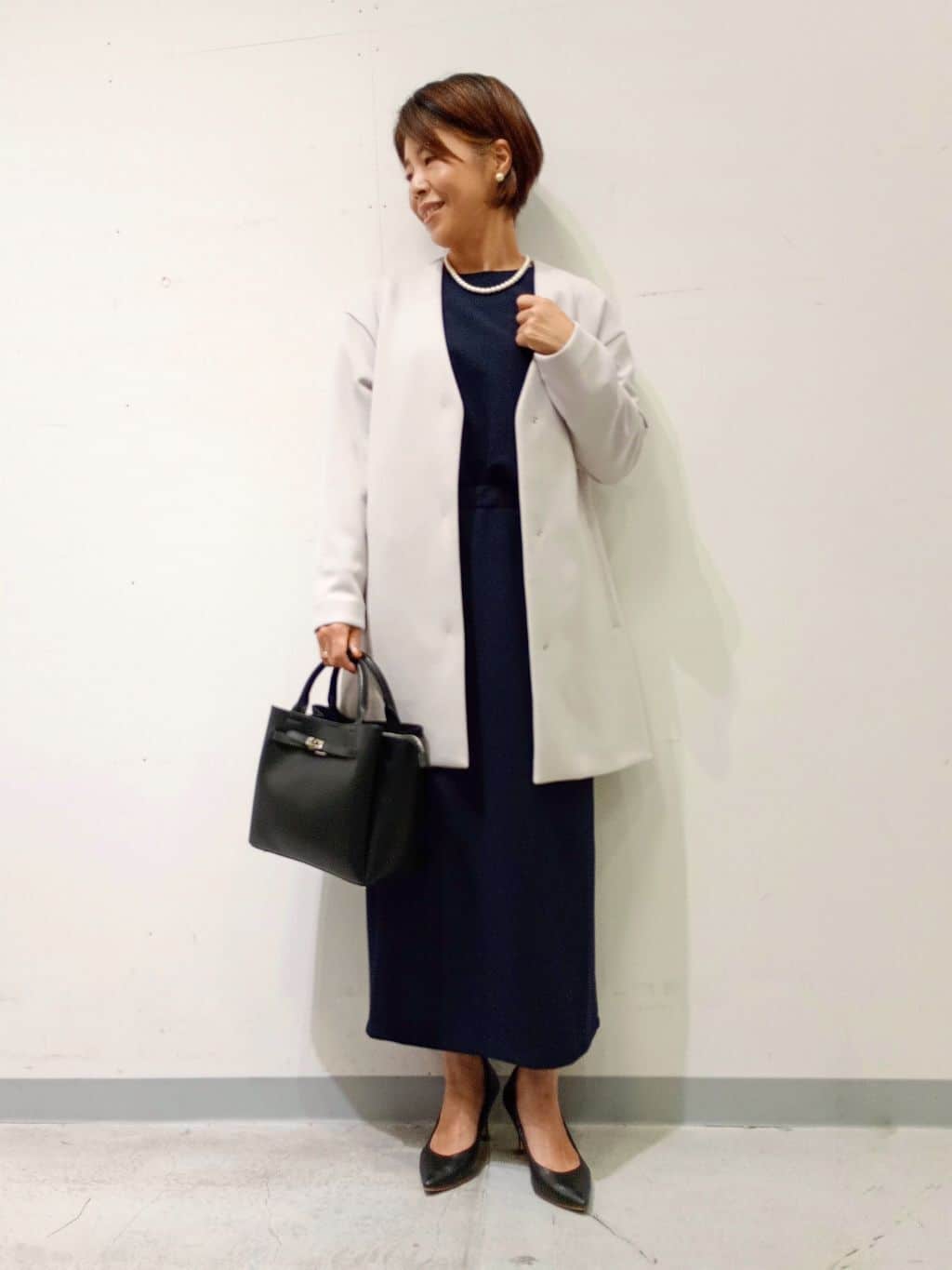 Kさんの「INDIVI｜【秋／軽羽織り】ノーカラーミドル丈ライトコート」を使ったコーディネート