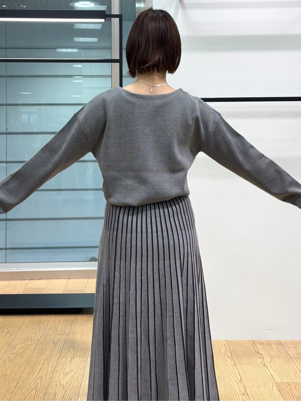 asamiさんの「INDIVI｜【洗える／SETUP可能】ジャカードニット プリーツスカート」を使ったコーディネート