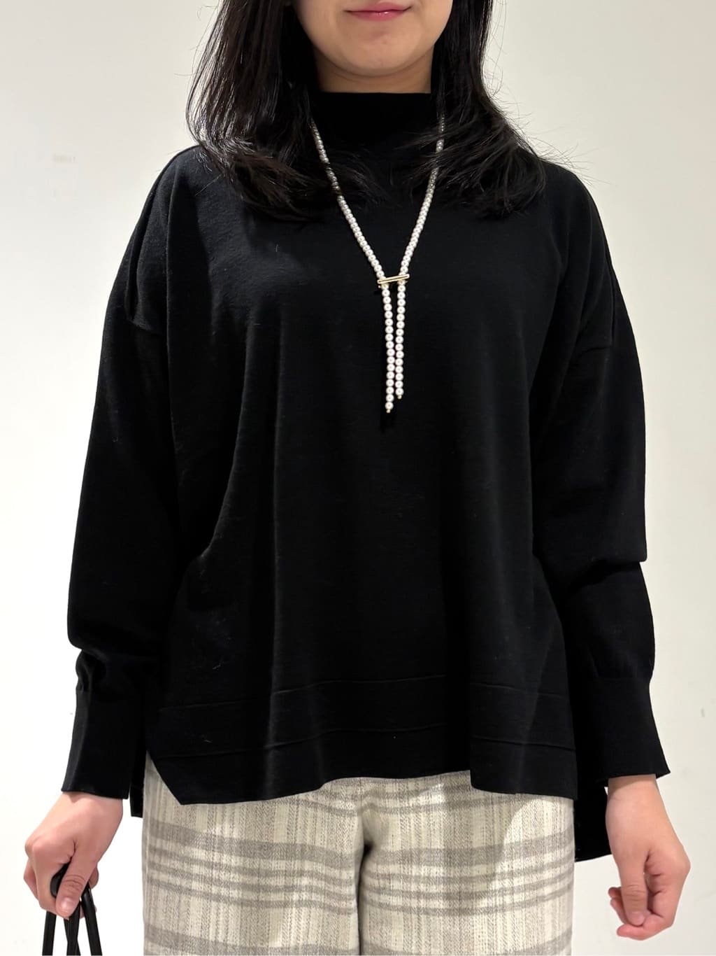 momokoさんの「INDIVI｜【洗える／毛玉になりにくい】エクストラファインウール ハイネックニット」を使ったコーディネート