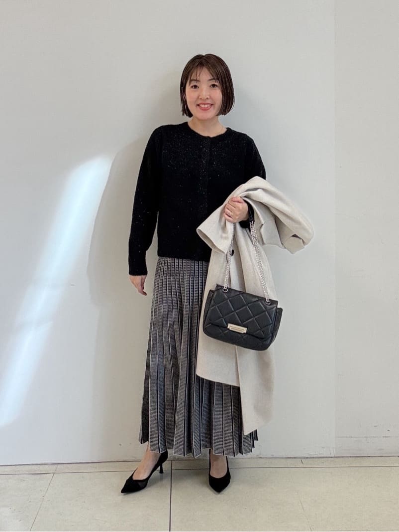 yoshiyaさんの「INDIVI｜キルトフラップバッグ」を使ったコーディネート