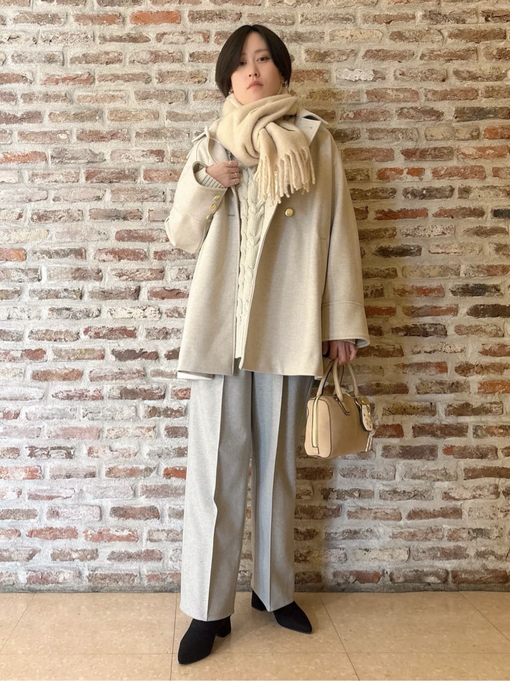 しばさんの「THE SHOP TK｜クラシカルな装い ウールライクスタンドカラーコート」を使ったコーディネート