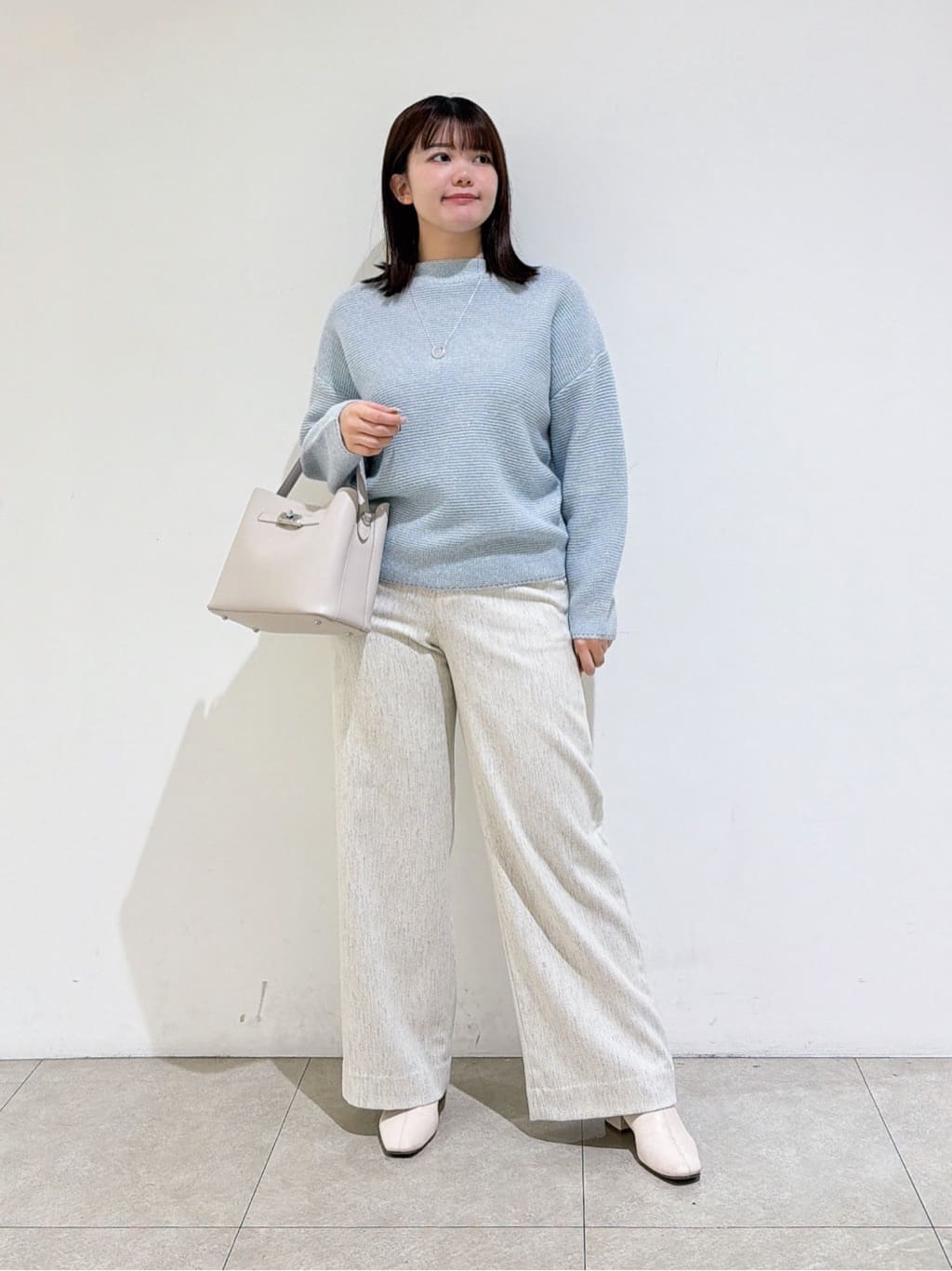 emikaさんの「INDIVI｜【洗える／大人ラメ】カラーMIXボトルネックニット」を使ったコーディネート