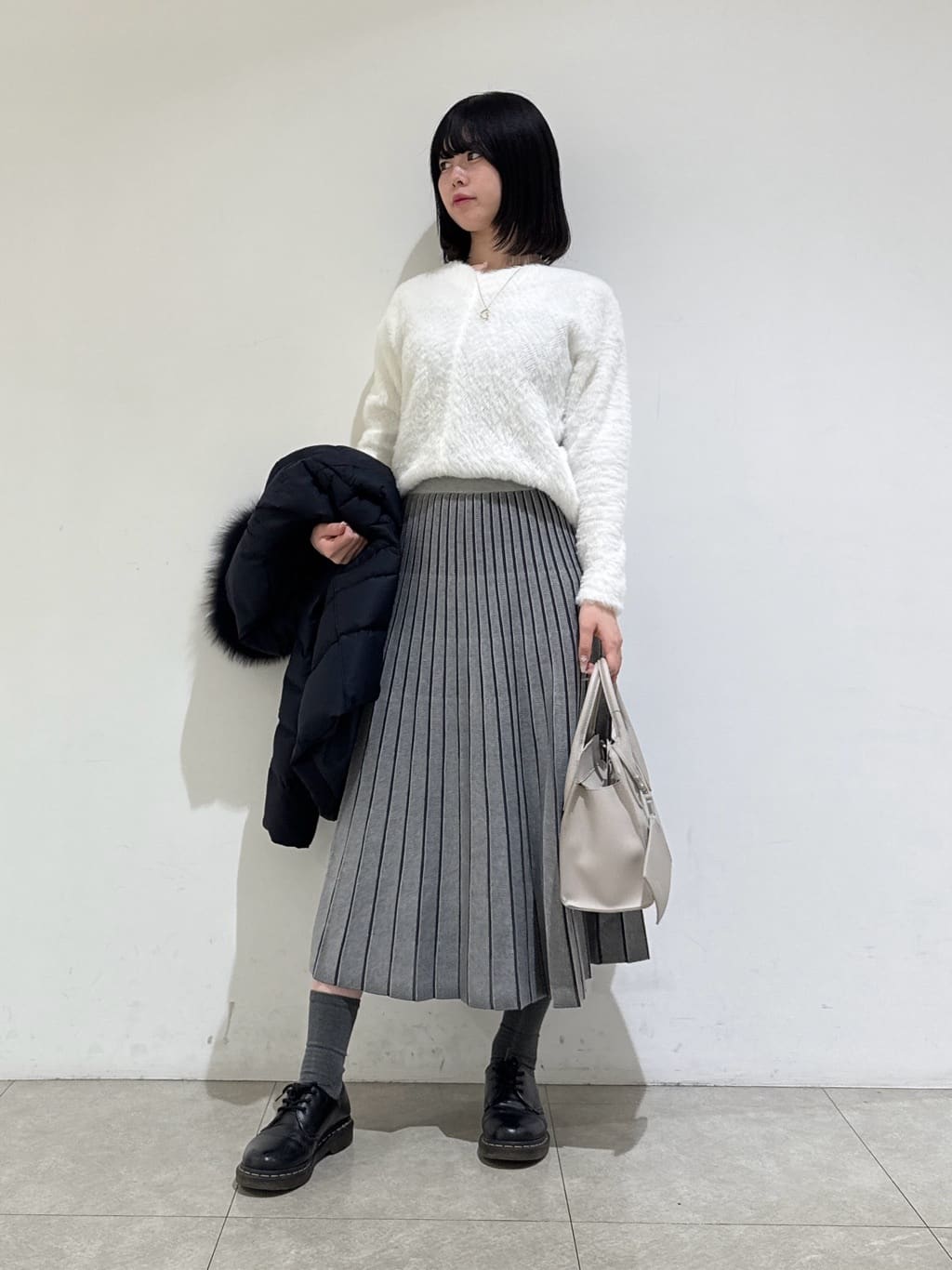 rinaさんの「INDIVI｜【洗える／SETUP可能】ジャカードニット プリーツスカート」を使ったコーディネート