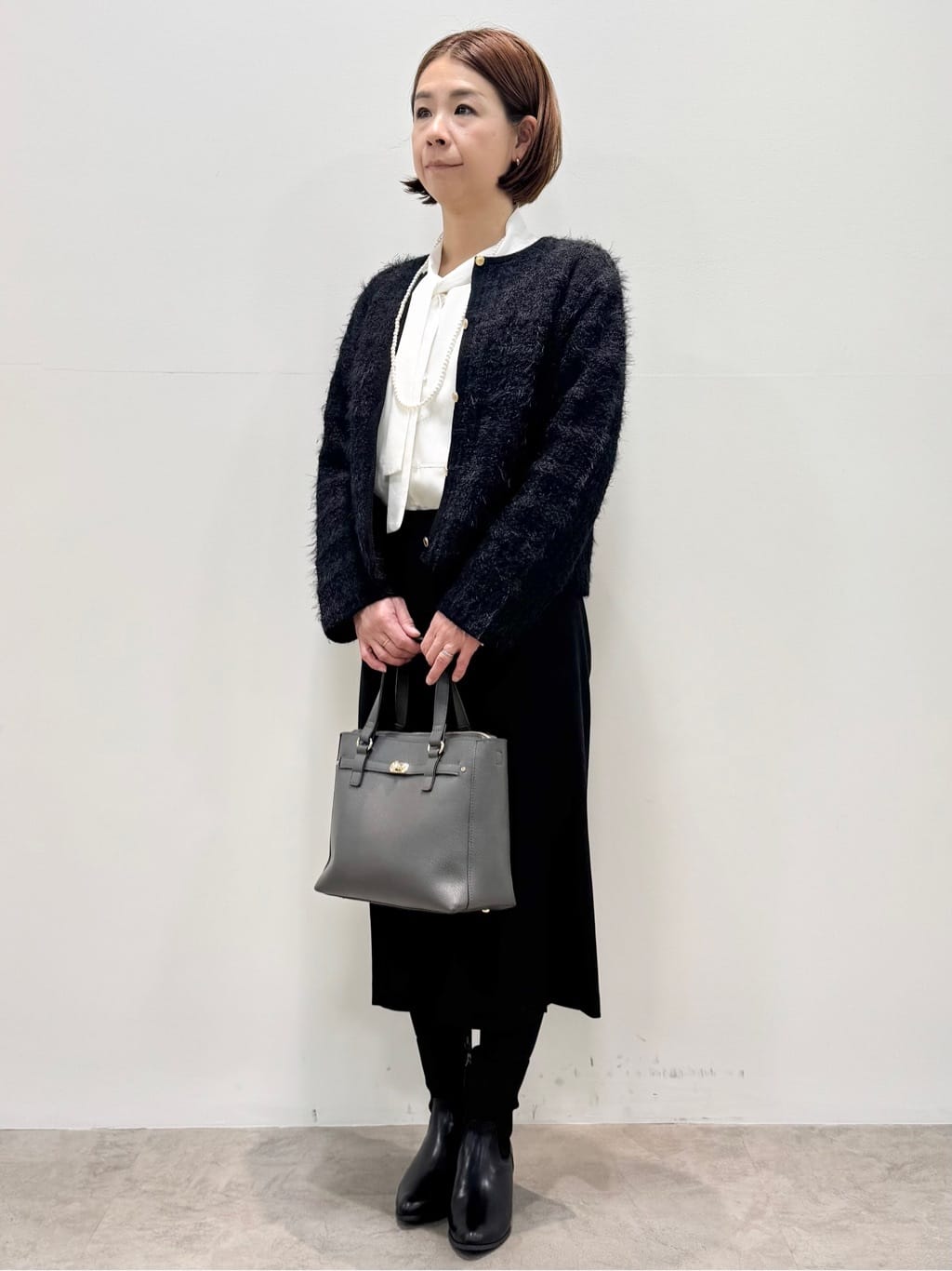 koyaさんの「Reflect｜【お食事会やお出かけに◎】ふんわりジャカード編みカーディガン」を使ったコーディネート