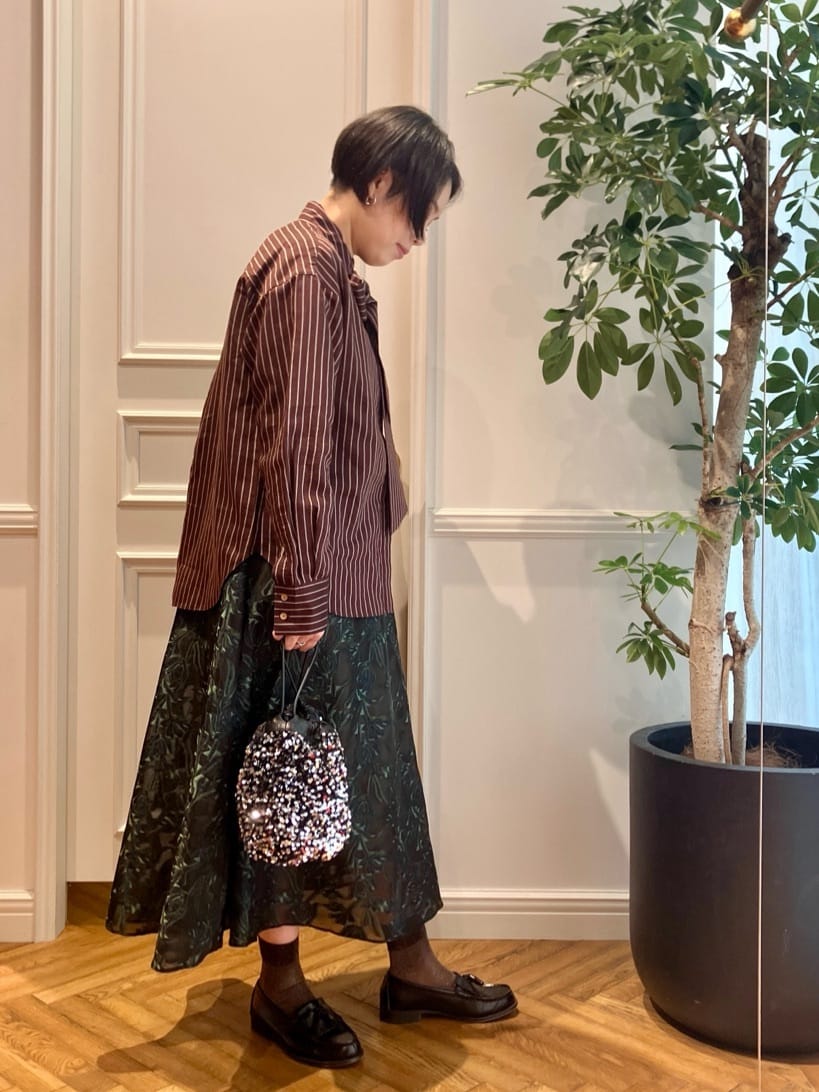 konominさんの「DRESSTERIOR｜スパンコール2WAY巾着バッグ」を使ったコーディネート