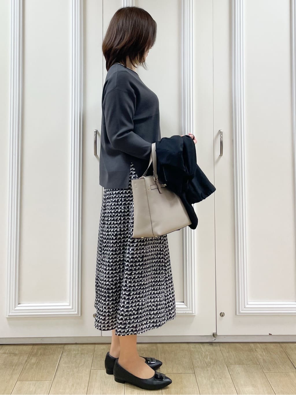 めいさんの「Reflect｜【ニットスタイルが華やかに◎】チドリ風プリントフレアスカート」を使ったコーディネート