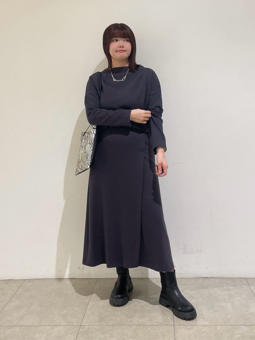 emikaさんの「INDIVI｜【SETUP可能／洗える／UVケア】ライトジャージ ボトルネックトップス」を使ったコーディネート