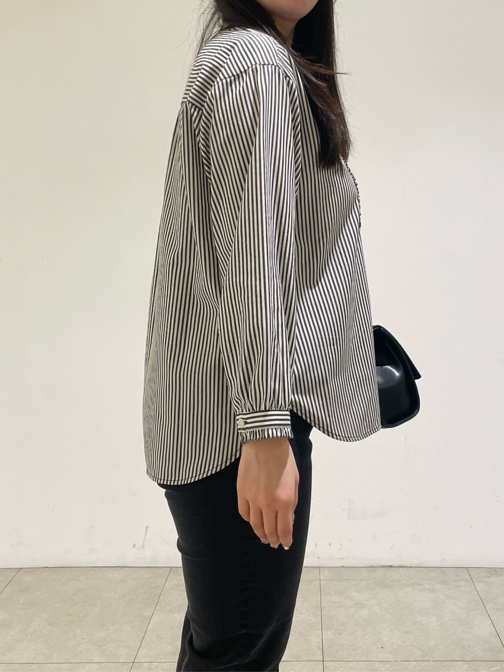 emikaさんの「INDIVI｜【洗える】胸元タックフリル長袖ブラウス」を使ったコーディネート