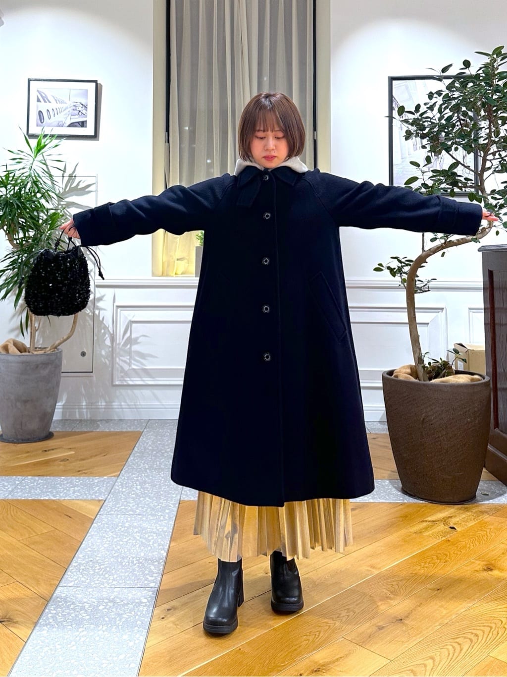 なべこさんの「DRESSTERIOR｜◆【洗える/ストレッチ性/オンオフ】箔プリントプリーツスカート」を使ったコーディネート