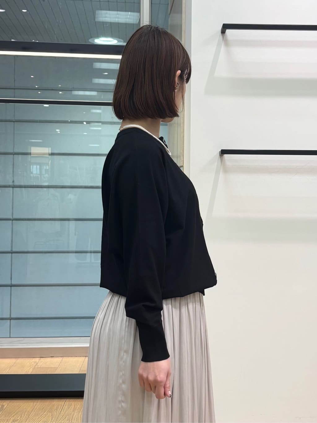 asamiさんの「INDIVI｜【洗える／丈調整可能】ギャザーフレアスカート」を使ったコーディネート
