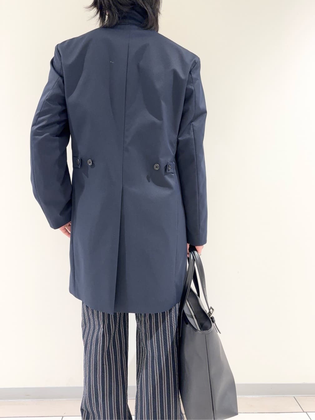 及川さんの「TAKEO KIKUCHI｜撥水ツイル スタンドカラー コート」を使ったコーディネート