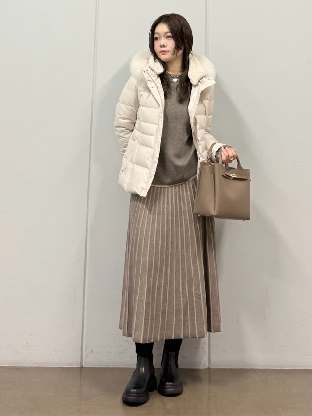 mizukiさんの「INDIVI｜【名品／撥水／抗菌防臭】ショート丈リサイクルダウンコート」を使ったコーディネート