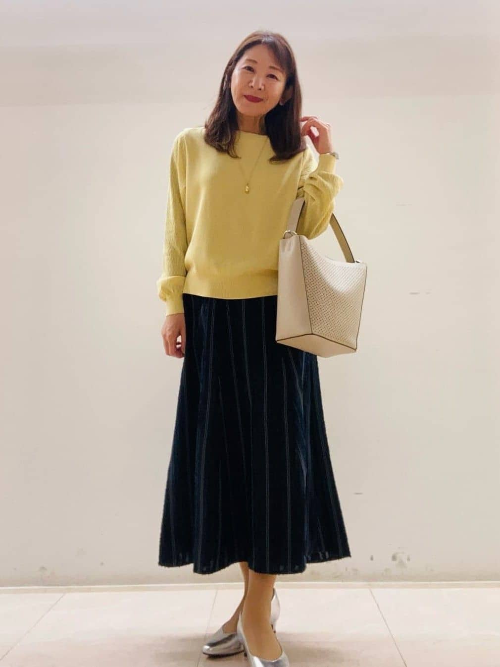 kurodaさんの「Reflect｜【撥水】ストレッチタフタミドル丈スタンドカラーコート」を使ったコーディネート