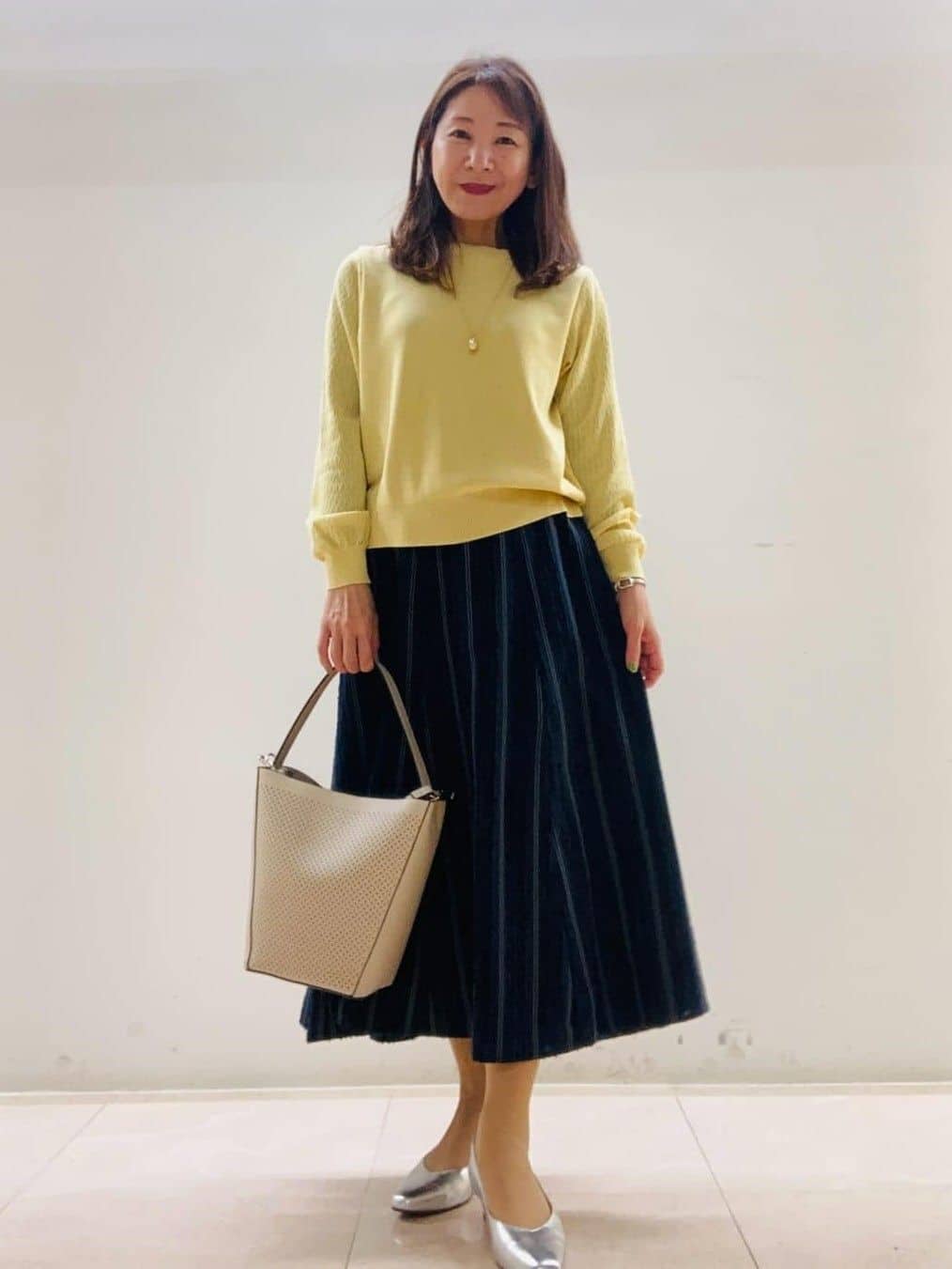 kurodaさんの「Reflect｜【撥水】ストレッチタフタミドル丈スタンドカラーコート」を使ったコーディネート