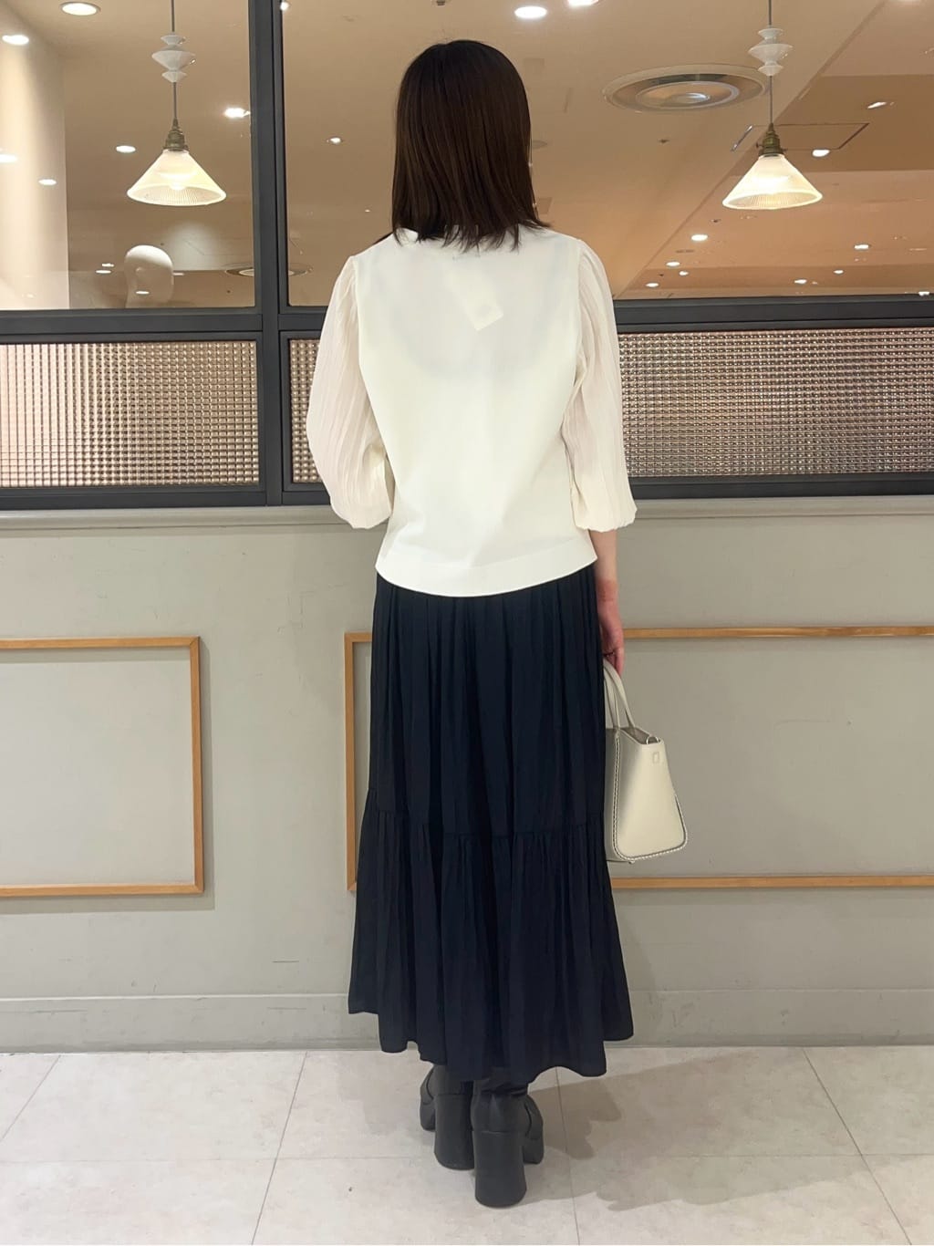 kumiさんの「INDIVI｜【洗える／丈調整可能】ギャザーフレアスカート」を使ったコーディネート