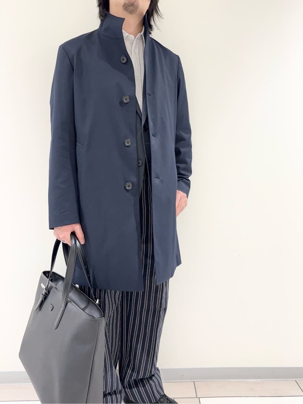 及川さんの「TAKEO KIKUCHI｜撥水ツイル スタンドカラー コート」を使ったコーディネート