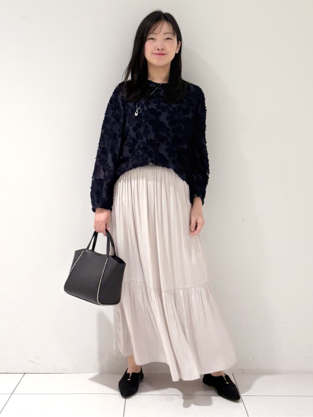 momokoさんの「INDIVI｜【洗える／丈調整可能】ギャザーフレアスカート」を使ったコーディネート