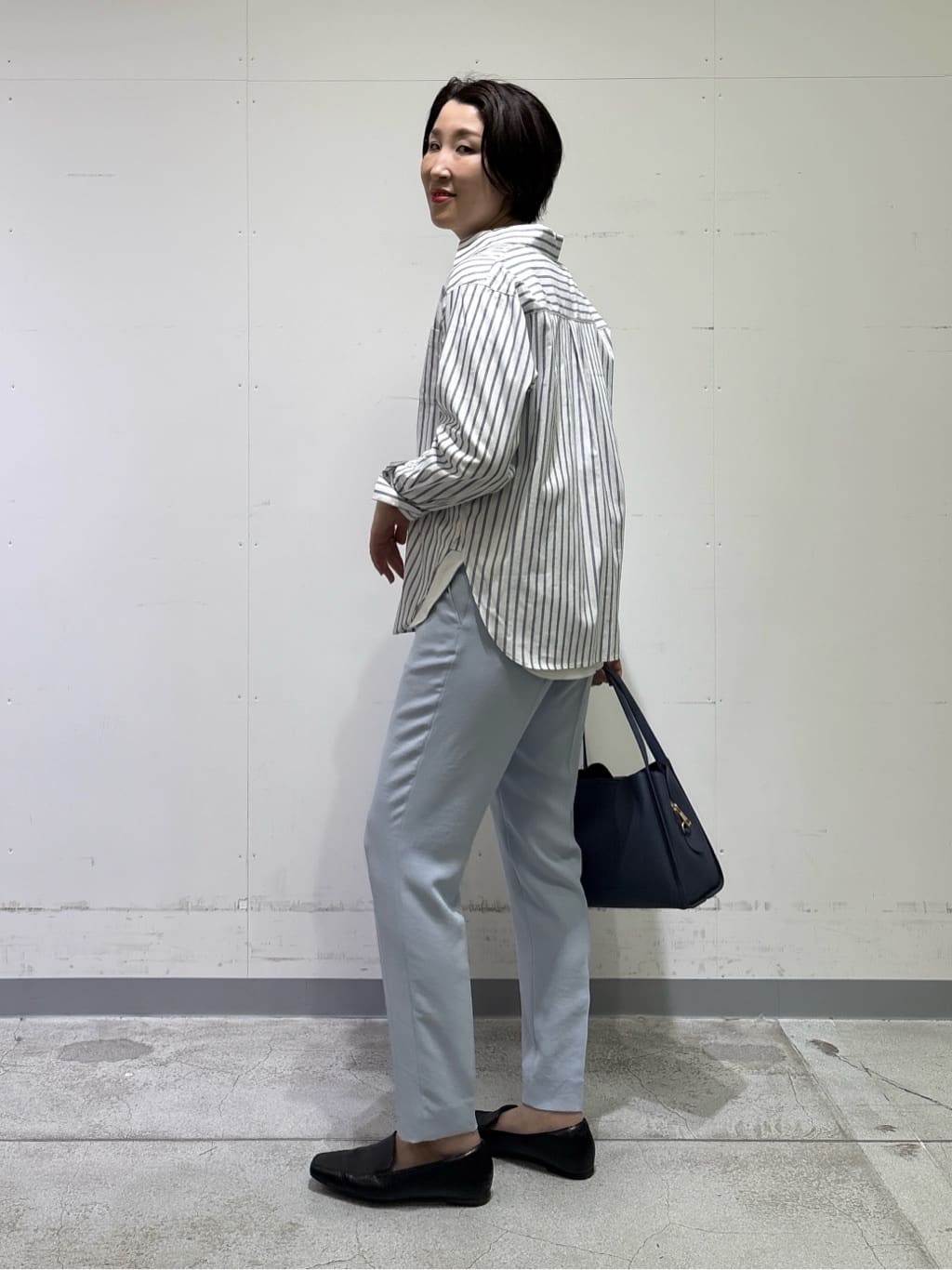 yuriさんの「INDIVI｜【洗える／UVケア／SETUP可】着る日傘テーパードパンツ」を使ったコーディネート