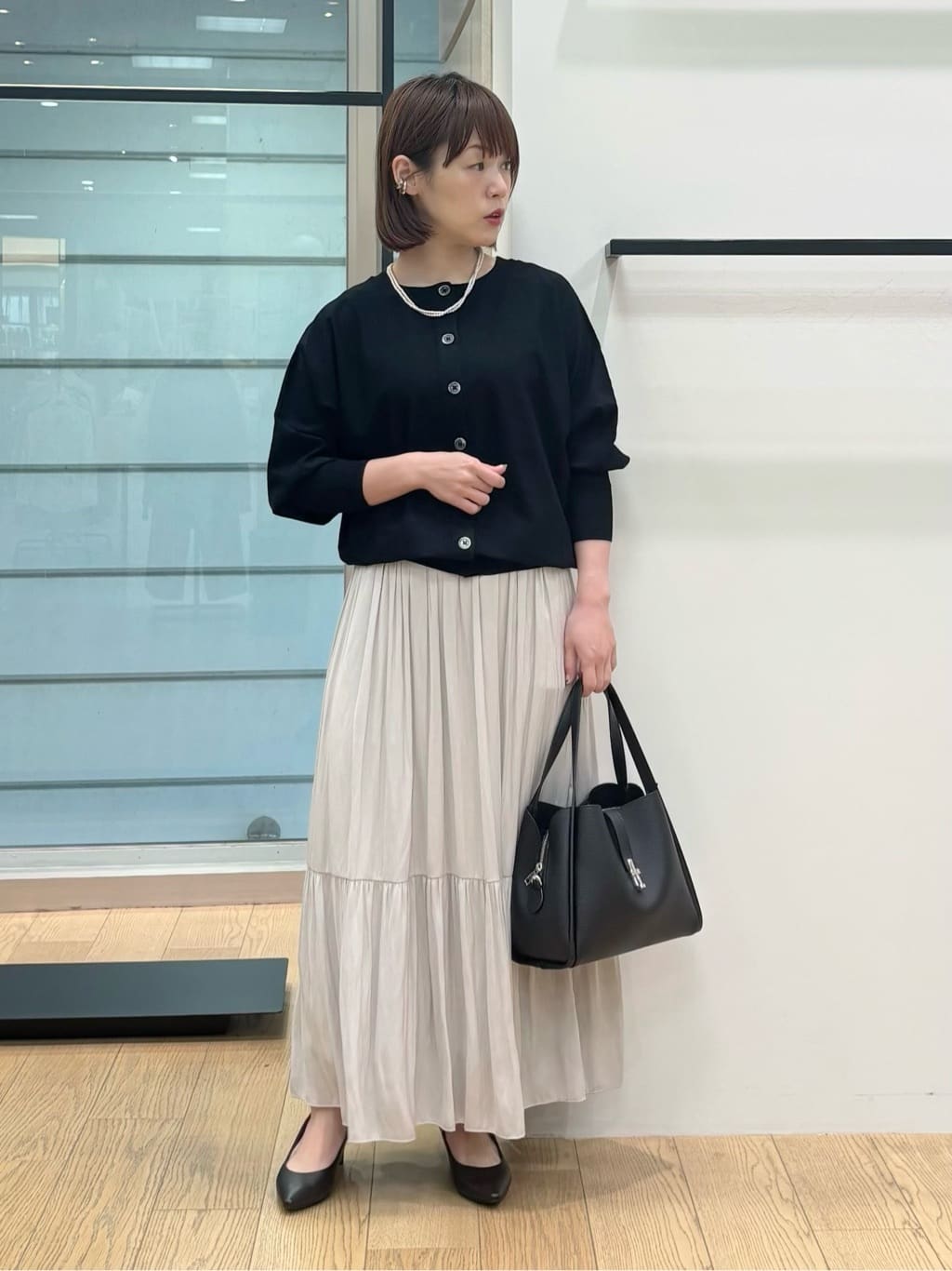 asamiさんの「INDIVI｜【洗える／丈調整可能】ギャザーフレアスカート」を使ったコーディネート