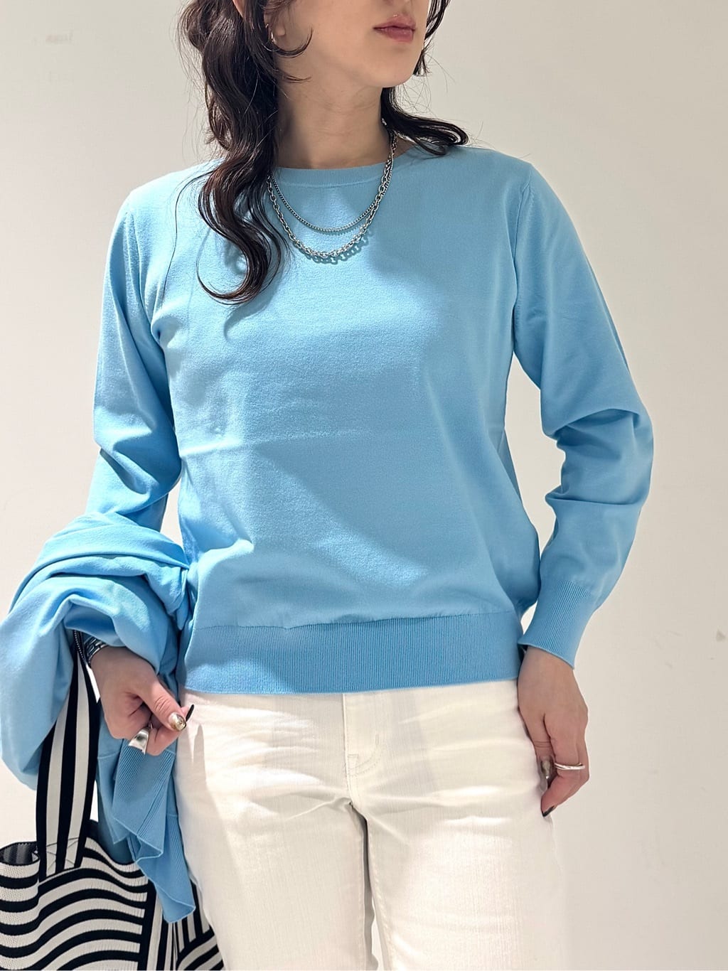 そんさんの「INDIVI｜【洗える／前後2WAY／アンサンブル可能】ドルマンスリーブカーディガン」を使ったコーディネート
