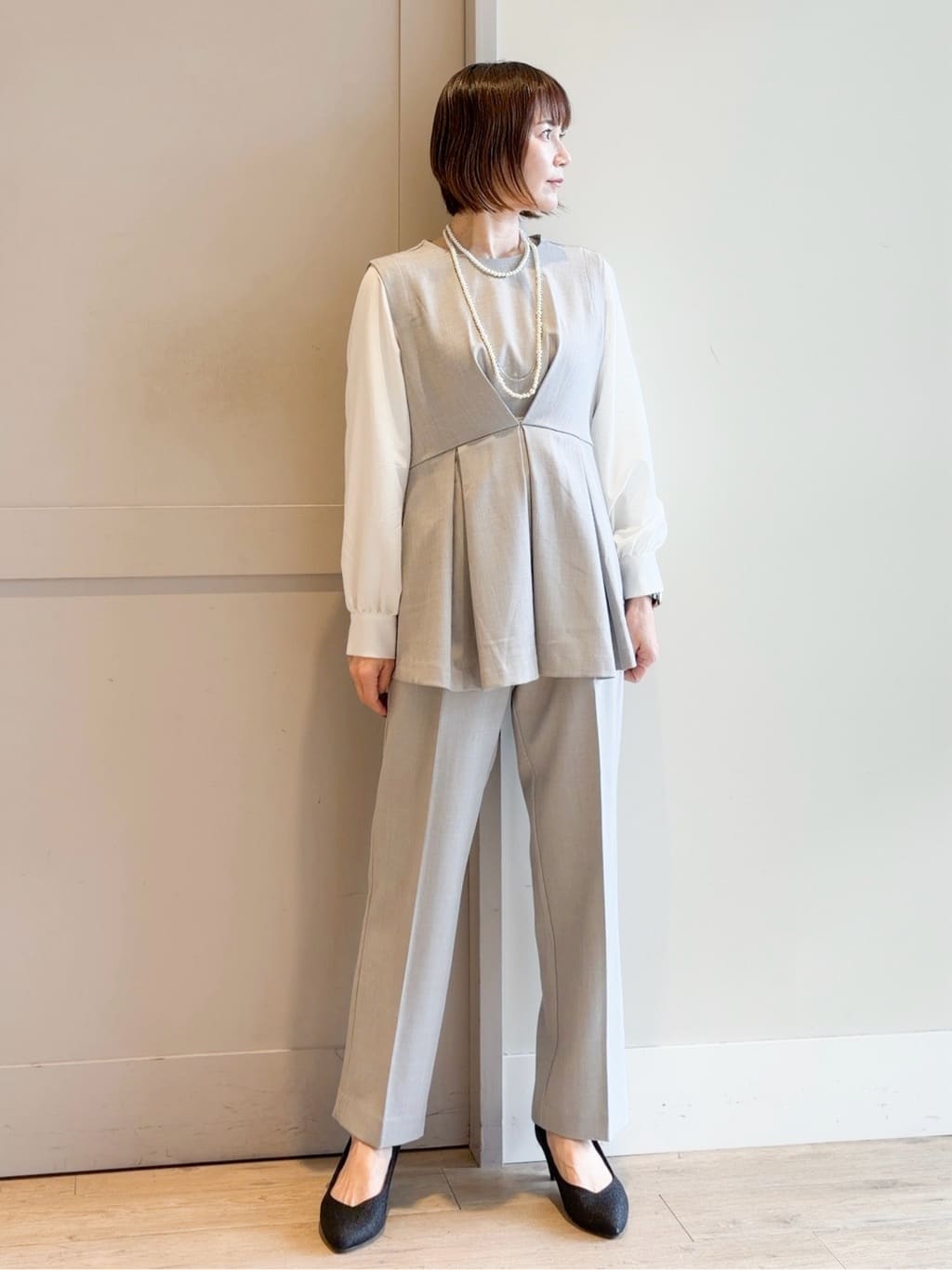 yamakoさんの「grove｜【撥水／シルエット2WAY】羽織るだけでサマになる、スタンドネックテントラインコート」を使ったコーディネート