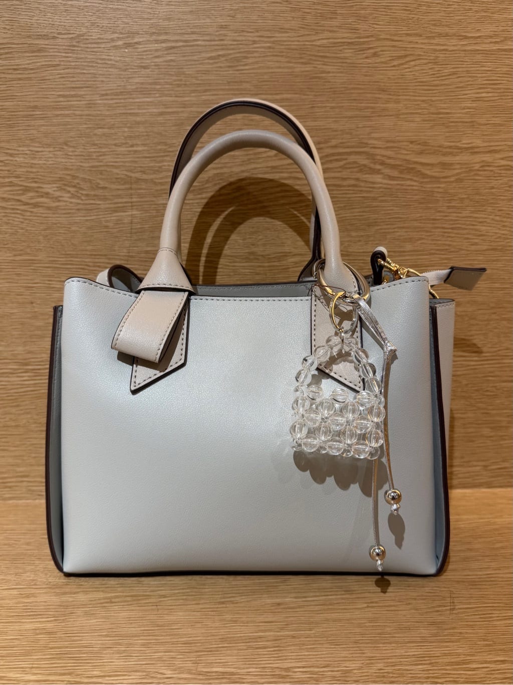 みーさんの「grove｜手編みビーズバッグチャーム」を使ったコーディネート