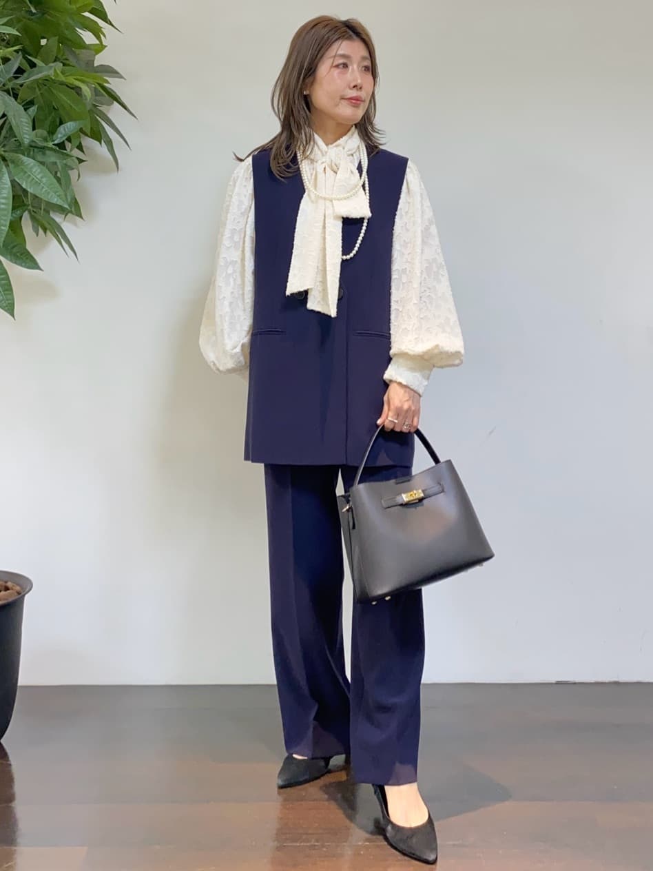 tomoさんの「UNTITLED｜◆【はっ水/洗える】タスランステンカラーコート」を使ったコーディネート