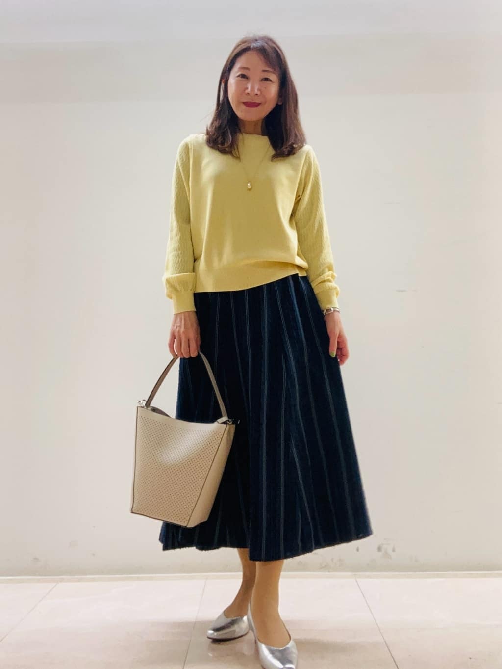 kurodaさんの「Reflect｜【撥水】ストレッチタフタミドル丈スタンドカラーコート」を使ったコーディネート