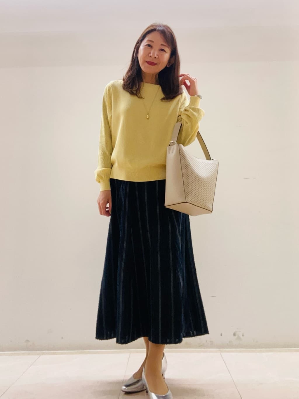 kurodaさんの「Reflect｜【撥水】ストレッチタフタミドル丈スタンドカラーコート」を使ったコーディネート