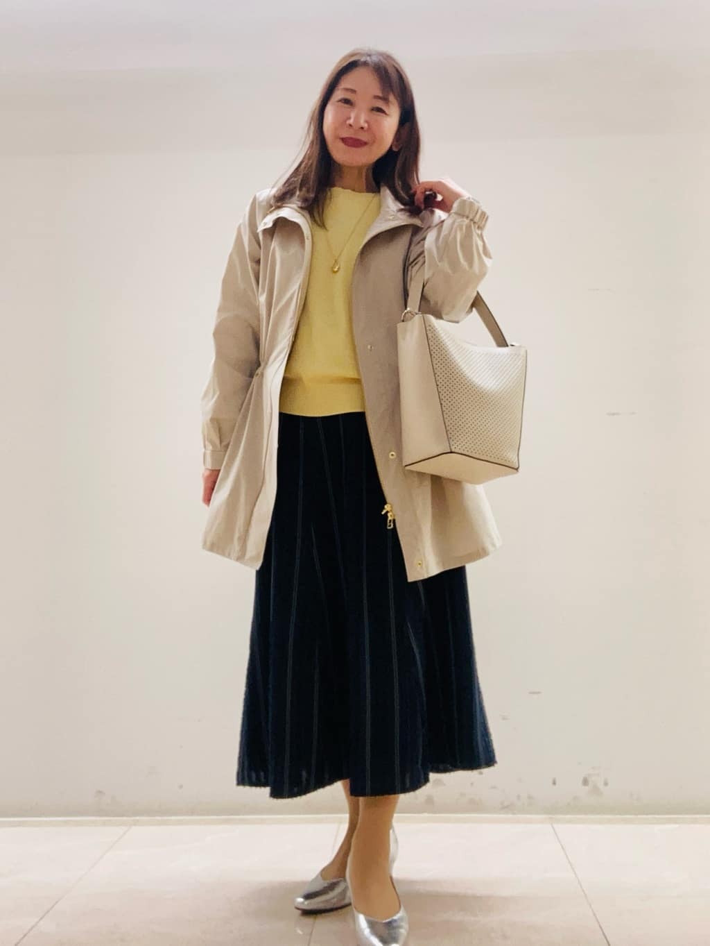 kurodaさんの「Reflect｜【撥水】ストレッチタフタミドル丈スタンドカラーコート」を使ったコーディネート