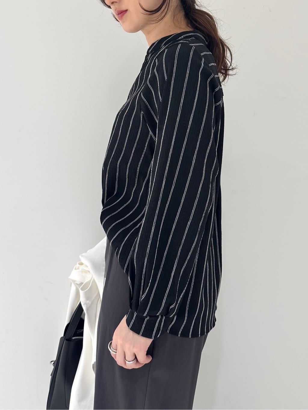 そんさんの「INDIVI｜【洗える／前後2WAY／アンサンブル可能】ドルマンスリーブカーディガン」を使ったコーディネート