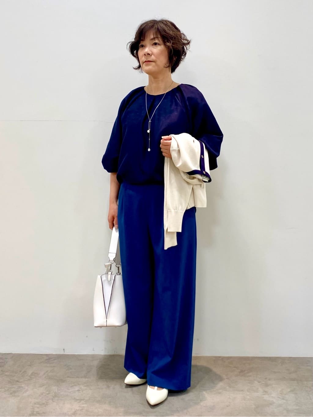 oharaさんの「Reflect｜【アンサンブル可】バイカラーカーディガン」を使ったコーディネート