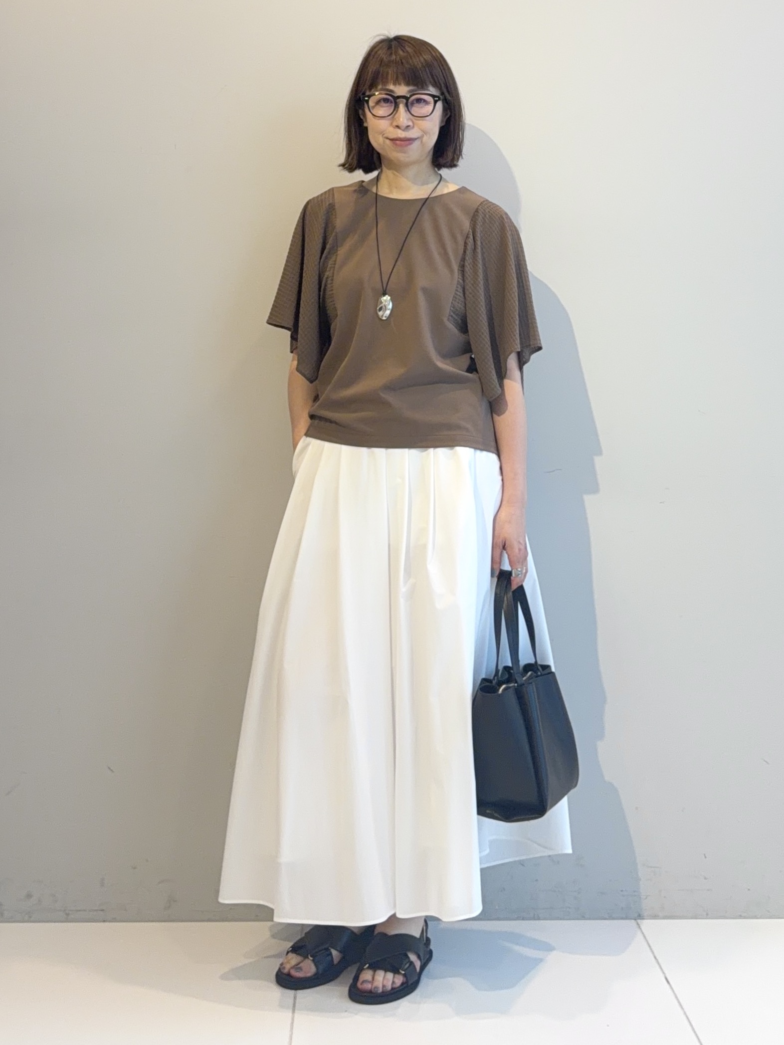 murayamaさんの「INDIVI｜【洗える／シアーチェック柄】異素材コンビスリーブトップス」を使ったコーディネート