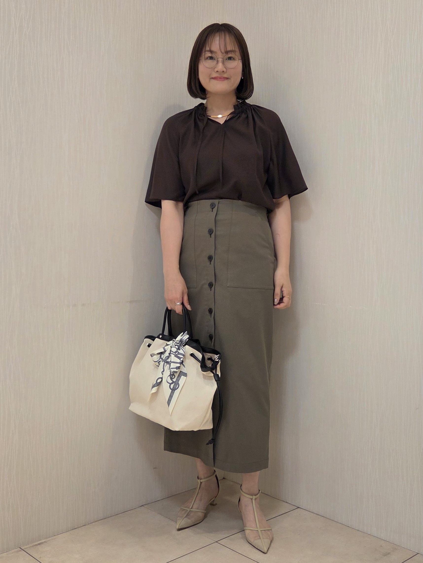 naokoさんの「UNTITLED｜【接触冷感/UVカット/吸水速乾/遮熱】ツイルボタンディティールスカート」を使ったコーディネート