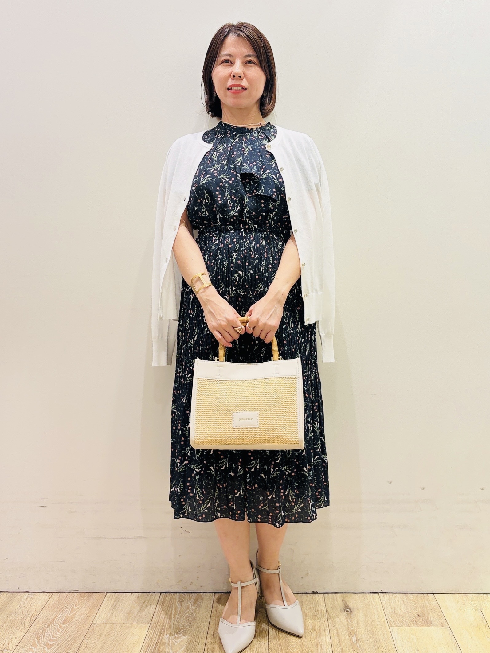 YUKOさんの「index｜◆【日比谷花壇コラボ】ラッフルタイプリーツワンピース【防シワ/洗濯機OK】」を使ったコーディネート