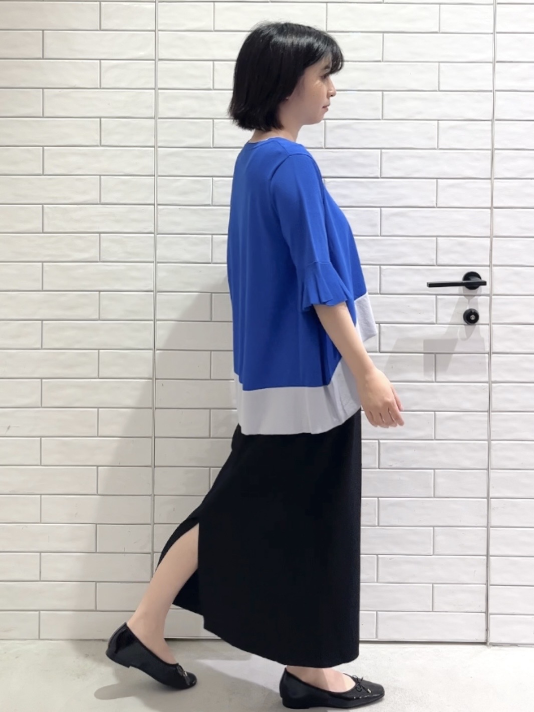 しおりさんの「OPAQUE.CLIP｜【UV／遮熱性】配色フレアシルエットニット《洗濯機OK》」を使ったコーディネート