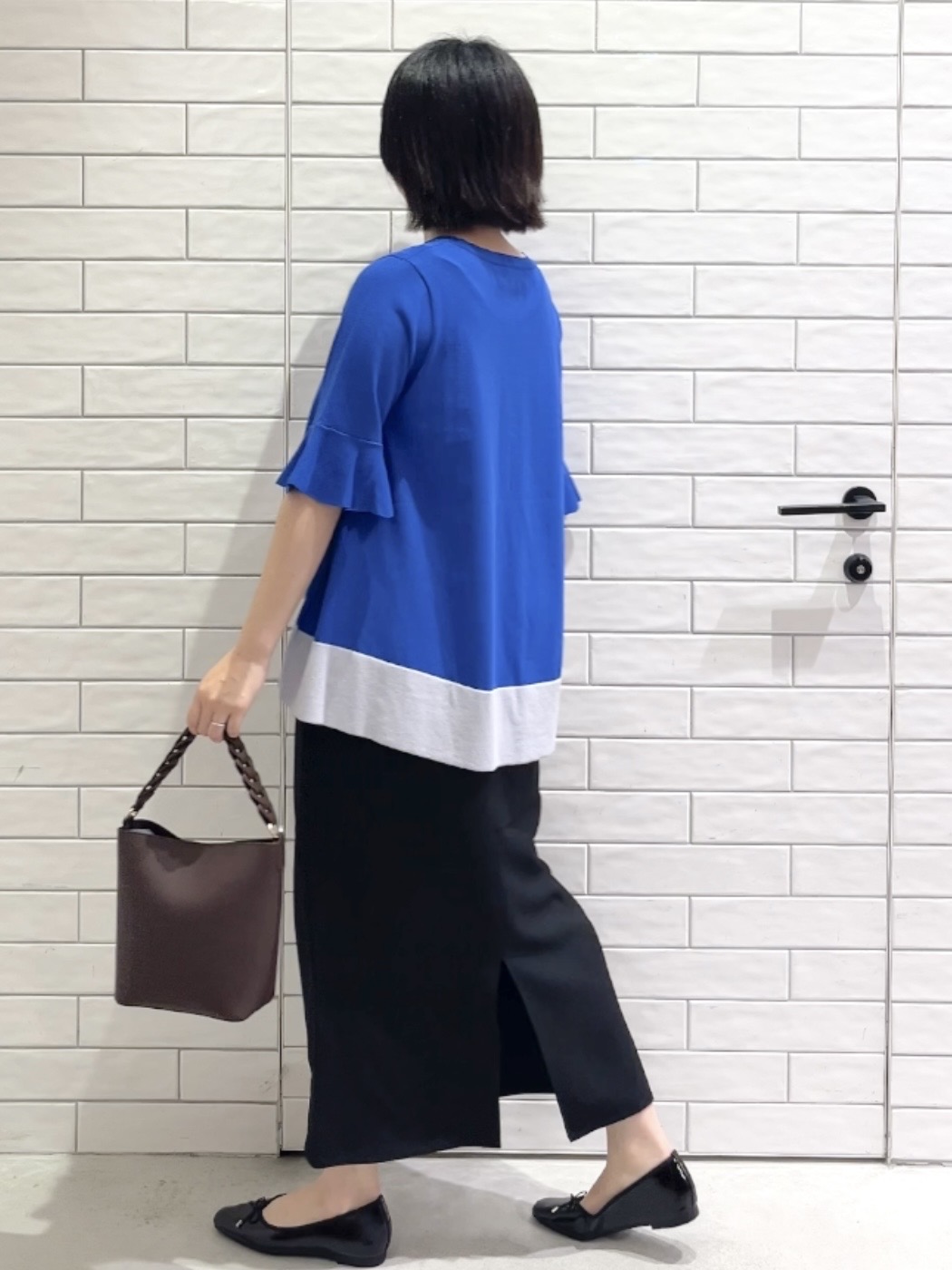 しおりさんの「OPAQUE.CLIP｜【UV／遮熱性】配色フレアシルエットニット《洗濯機OK》」を使ったコーディネート