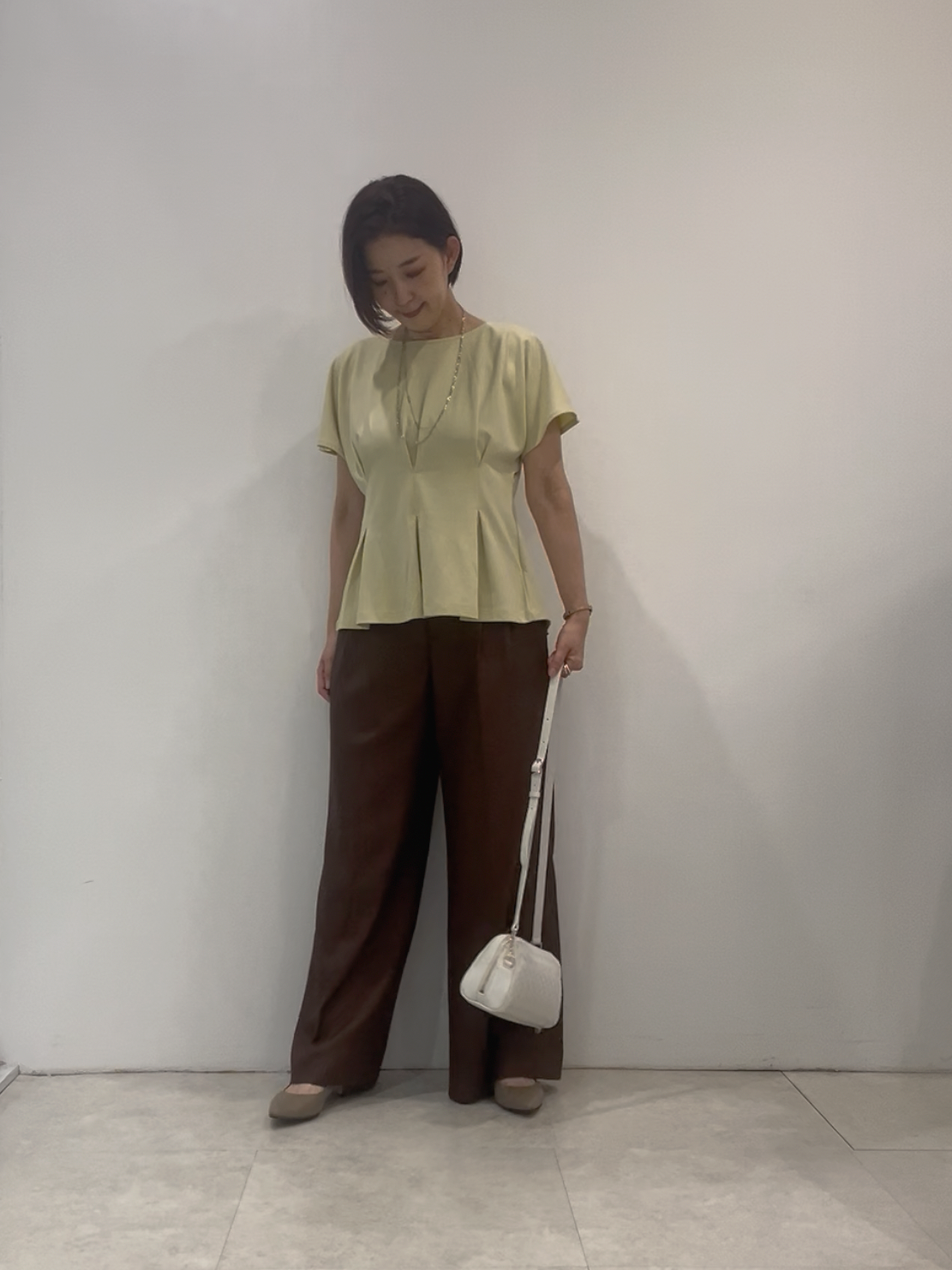 まどかさんの「UNTITLED｜【UVカット／接触冷感／吸水速乾】タックデザインフレアトップス」を使ったコーディネート