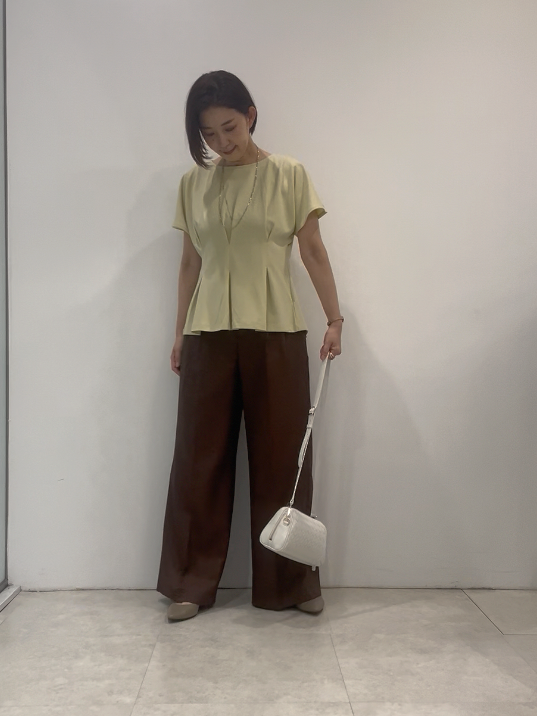 まどかさんの「UNTITLED｜【UVカット／接触冷感／吸水速乾】タックデザインフレアトップス」を使ったコーディネート