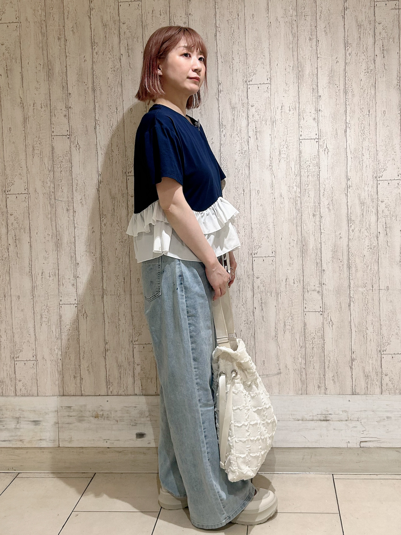 YOSHIMIさんの「index｜裾フリルドッキングTシャツ【洗濯機OK】」を使ったコーディネート