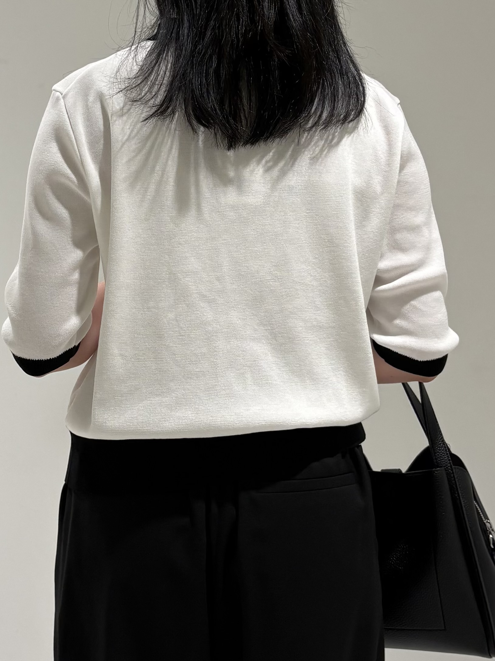 momokoさんの「INDIVI｜【バイカラー】衿付きシャツ風ニット」を使ったコーディネート