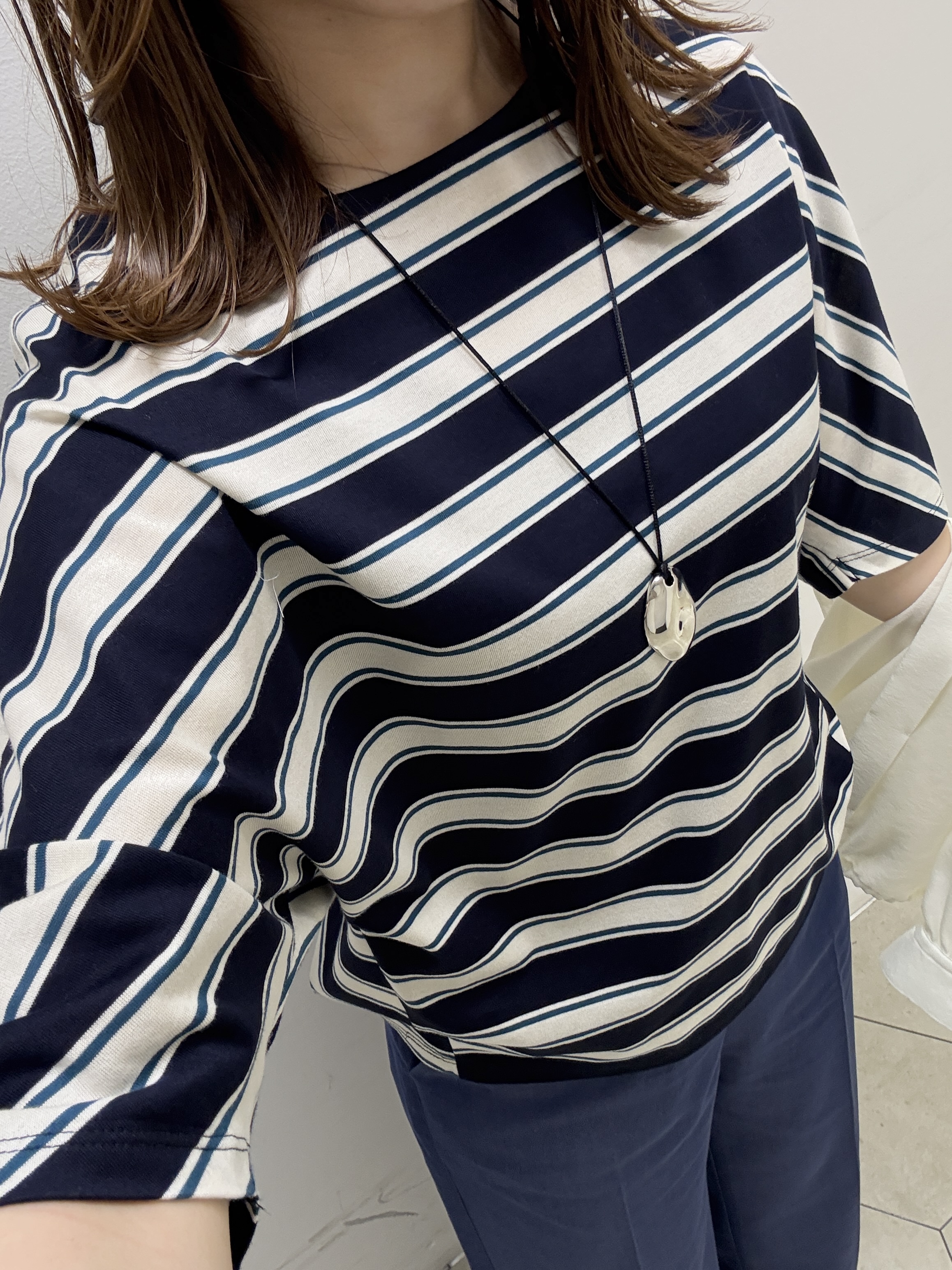 kahoさんの「INDIVI｜【体型カバー】ボーダードルマントップス」を使ったコーディネート