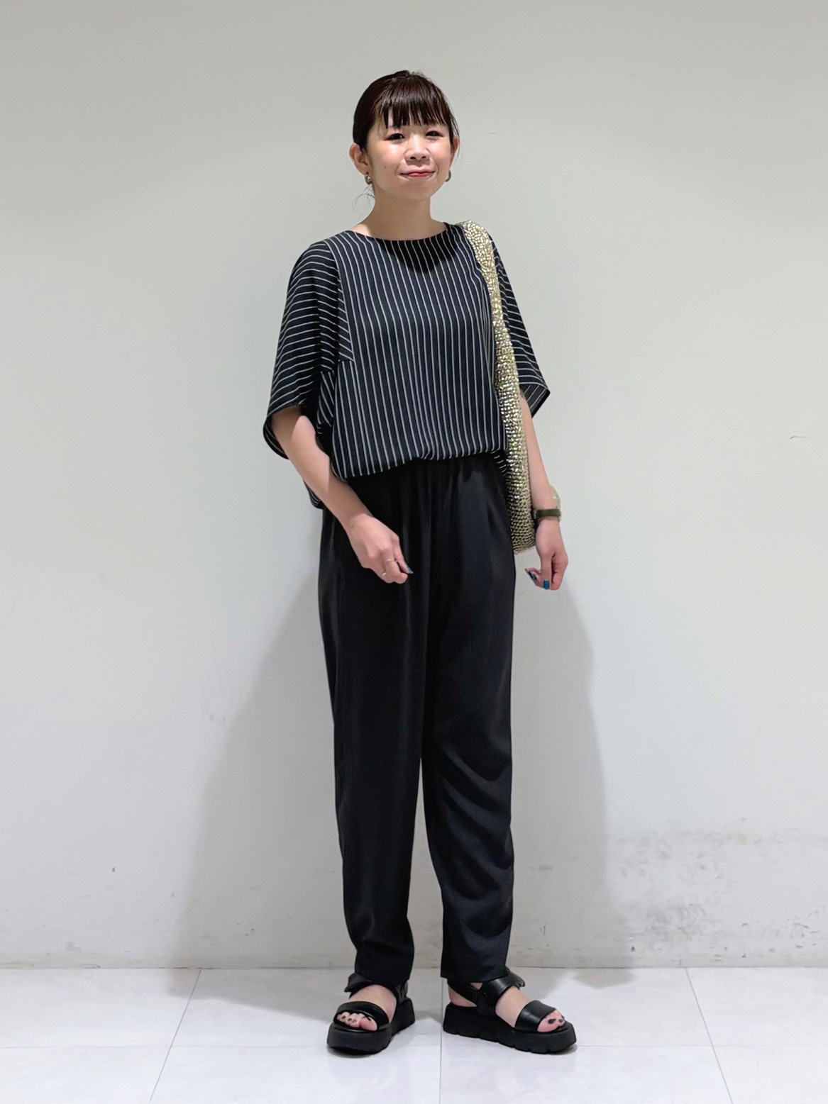 tsuyuさんの「INDIVI｜【大人カジュアル】メタリックかぎ編みボトルバッグ」を使ったコーディネート