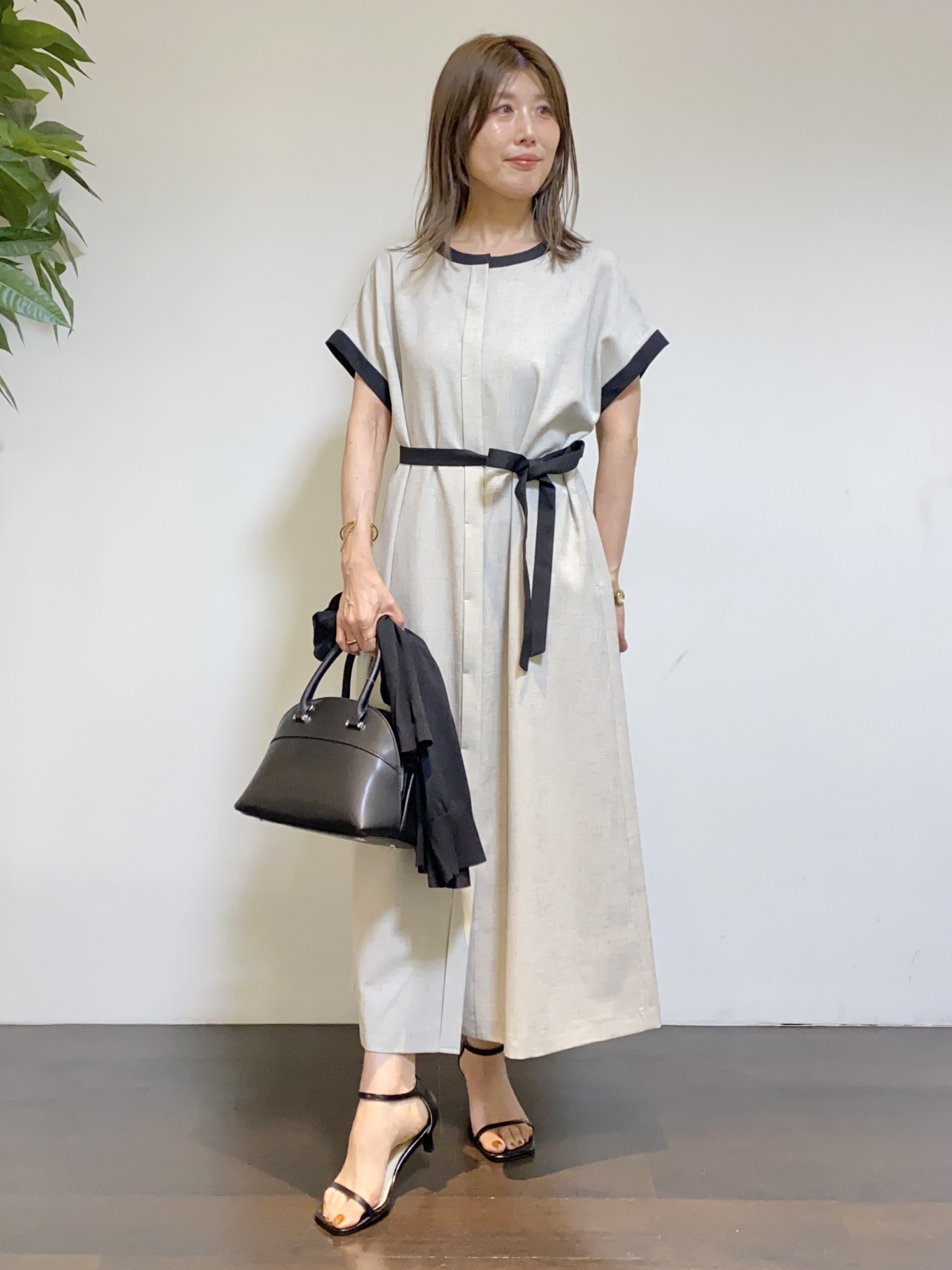 tomoさんの「UNTITLED｜【すっきり秋羽織り/前開きボタン】ドライタッチ5分袖カーディガン」を使ったコーディネート