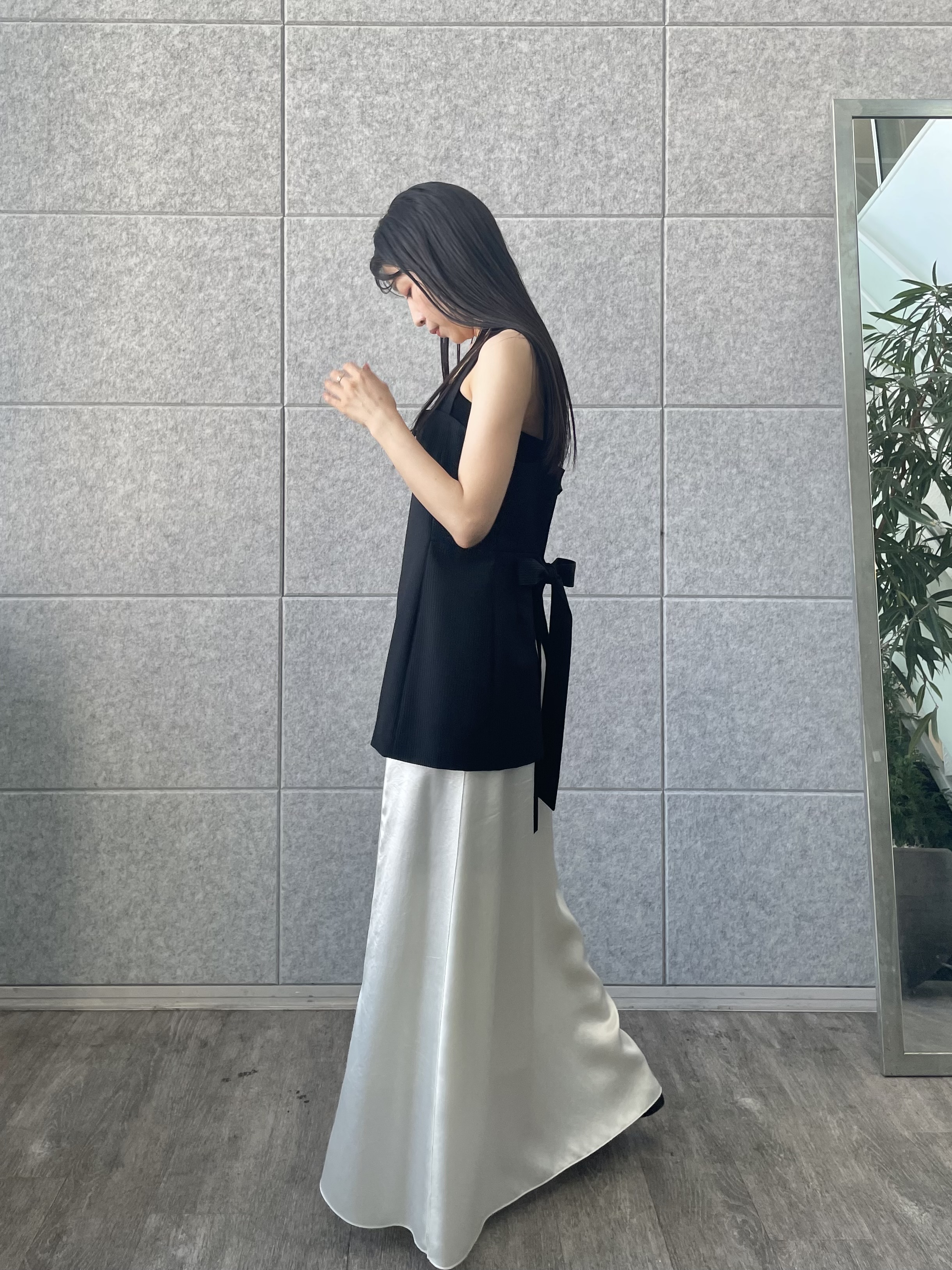 丸山加奈子さんの「CODE A｜corset stripe camisole」を使ったコーディネート
