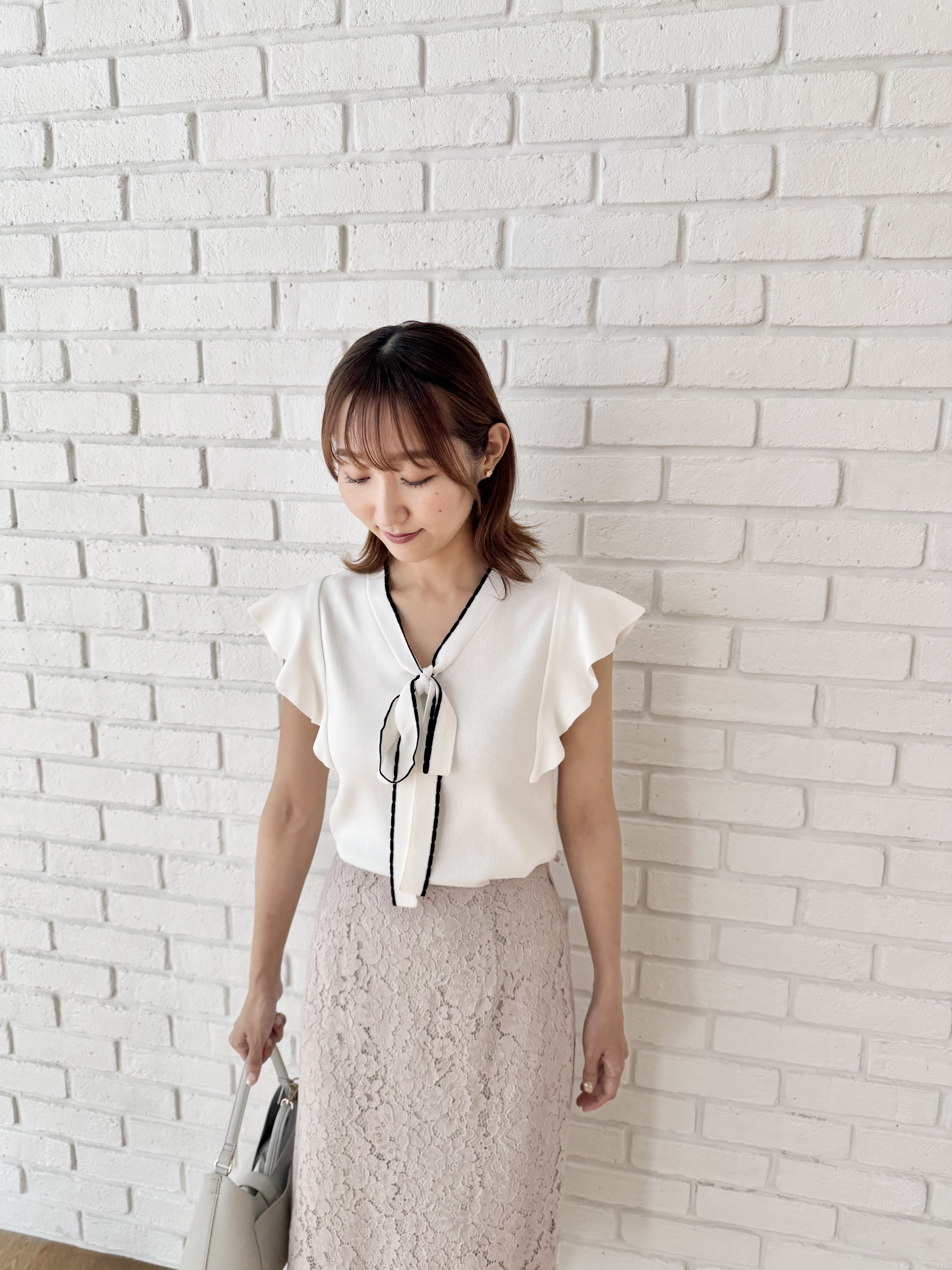 みぃさんの「index｜【UVケア／接触冷感】バイカラーボウタイフリルトップス《洗濯機OK》」を使ったコーディネート