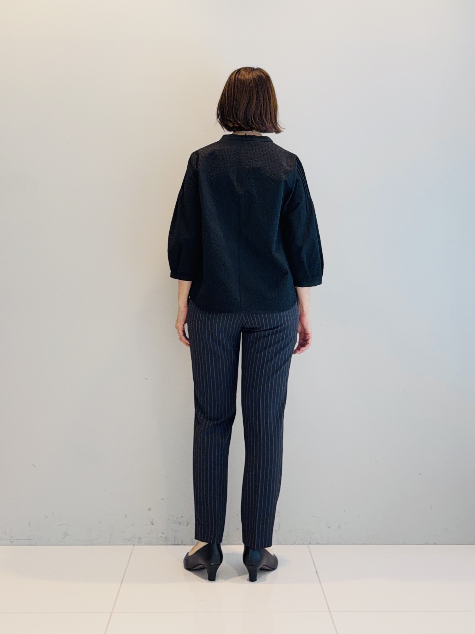 murayamaさんの「INDIVI｜【初秋にピッタリ！／洗える】凹凸素材ミニスタンドトップス」を使ったコーディネート