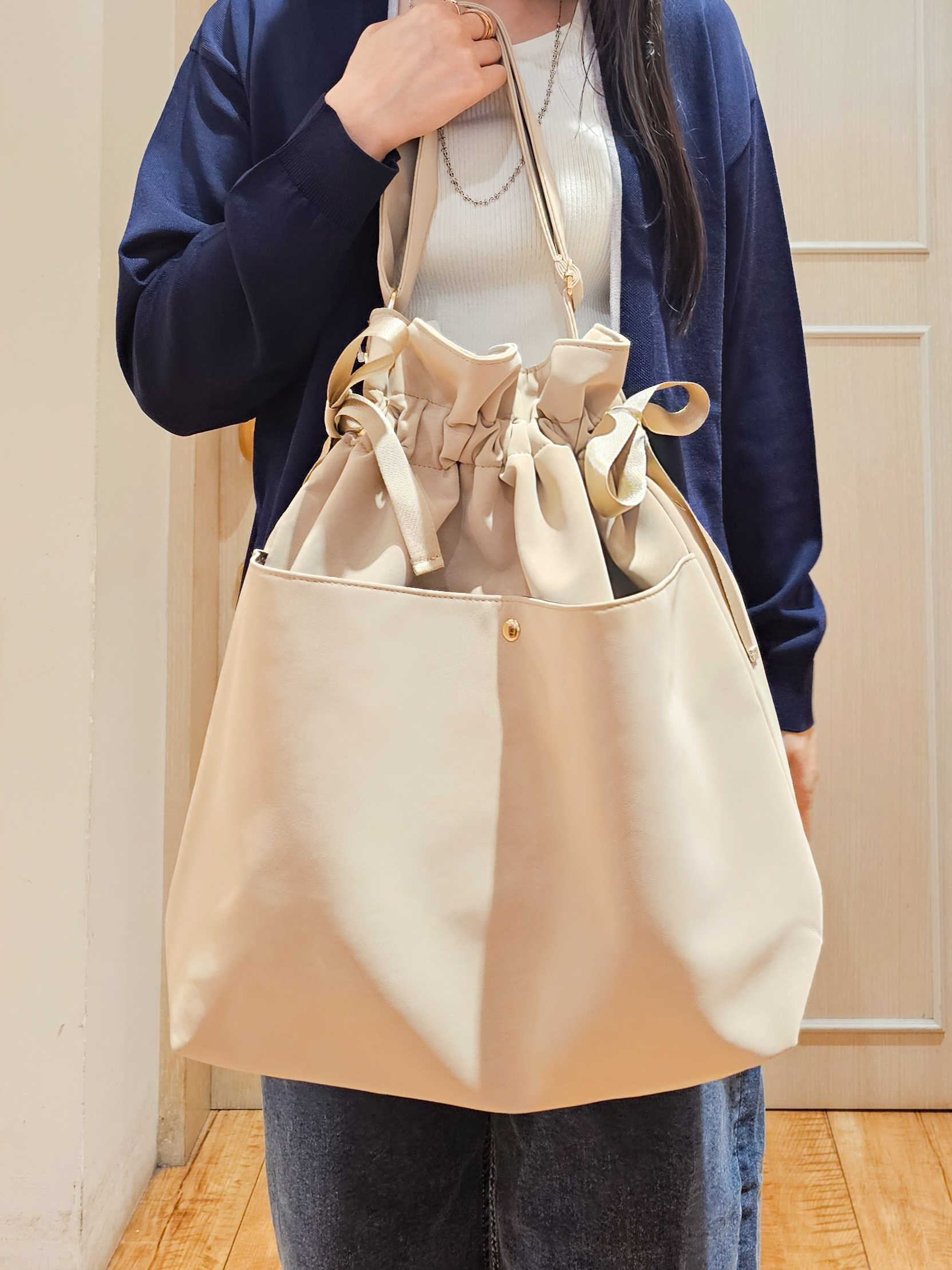 ゆゆさんの「SHOO･LA･RUE｜【お袖丈選べる/UV/毛玉になりにくい】目を引く配色デザイン ボタンレスミドルカーディガン」を使ったコーディネート