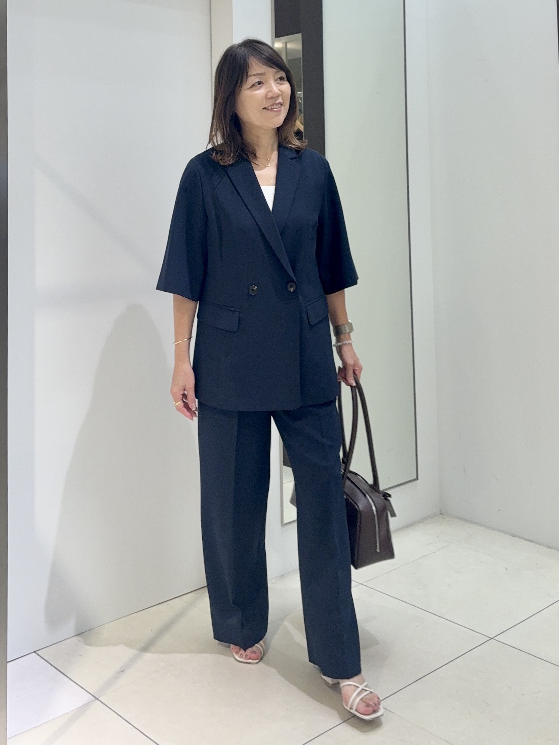 tomoさんの「UNTITLED｜【秋の通勤羽織/セットアップ可/UVカット】エアリークール半袖ジャケット」を使ったコーディネート